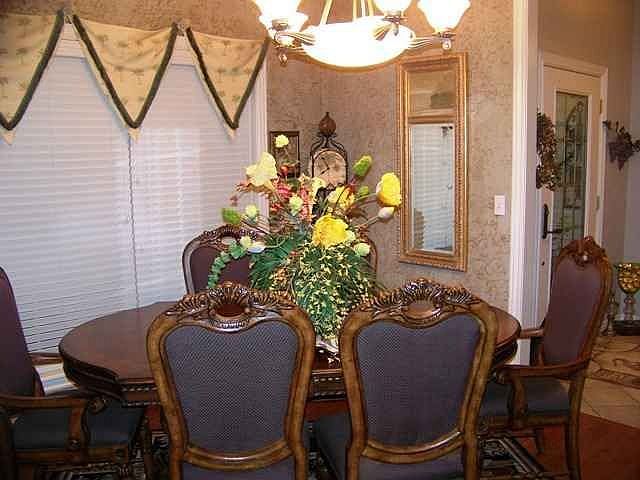 Formal dining rm. off of entry & next to kitchen.