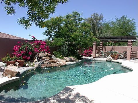 Sparkling playpool w/boulder wtrfl/. Single levels surround/custom gazebo
