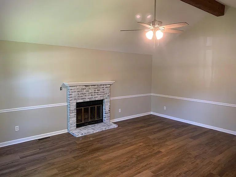 Living room with vaulted ceiling