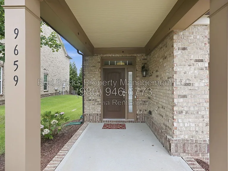9659 Camberley Ave NW — Photo 5