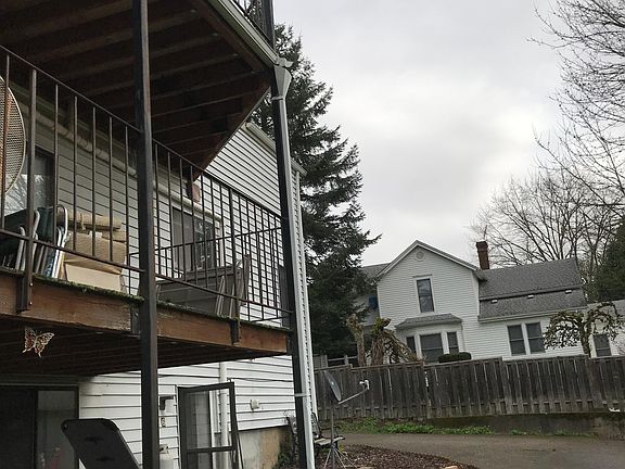 Where the inverter board is the patio, and that is the driveway beyond the brick wall