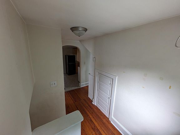 Top of stairs, Foyer & crawlspace storage area