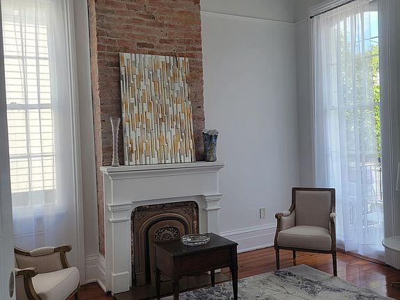 Living room with pull out couch, newly renovated with mostly new furnishings.
