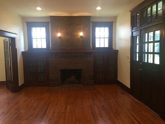 The fireplace and bookcases