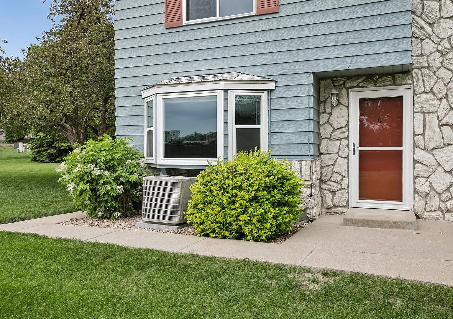 Townhome-Style Living with Greenbelt Views, Attached Garage & Community Pool! — Photo 1