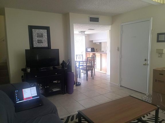 Another view of the living room +dining room, furniture not included