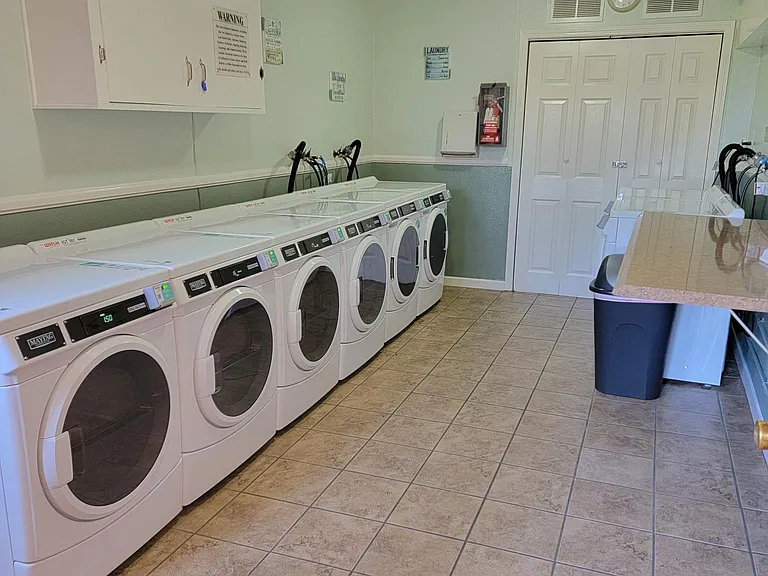 Front Laundry- Coinless Washer Machines & Dryers, All Front Loaders.