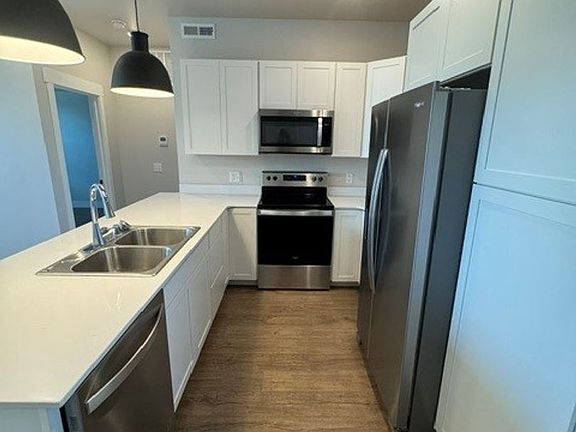 5th image of 6165 Farmstead Ave Unit 103