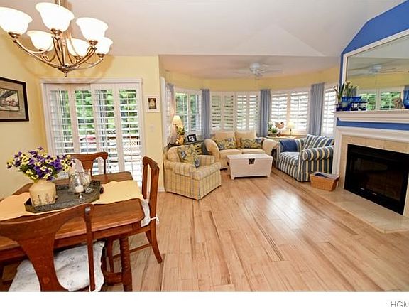 Open living space.  Door to deck with river views.