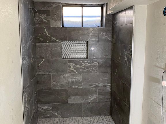 New downstairs bathroom, including this oversized shower