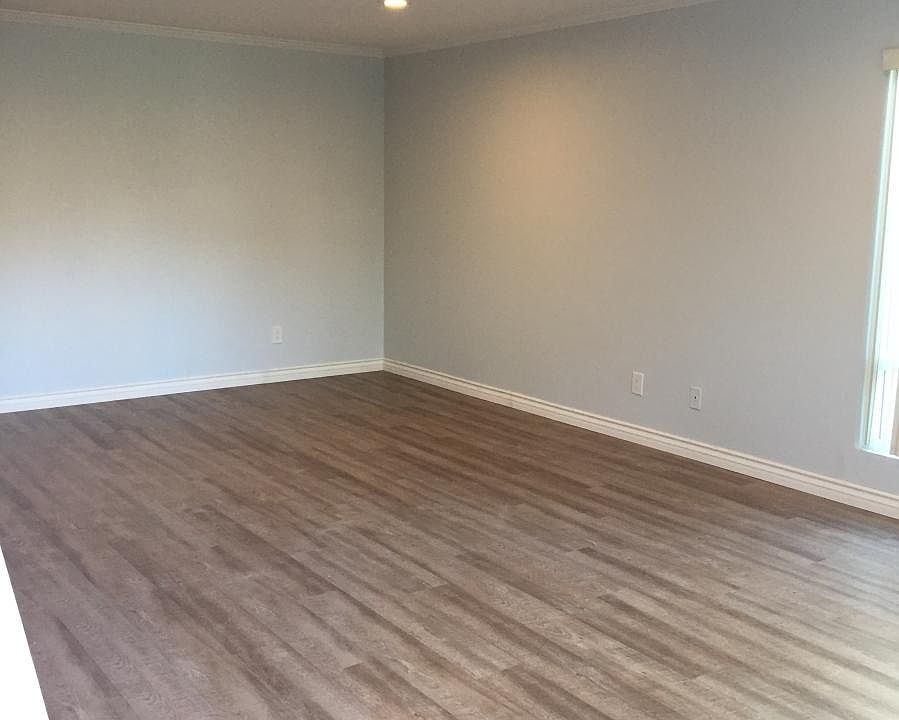 Crown molding recessed lights. Spacious private patio through sliding door.