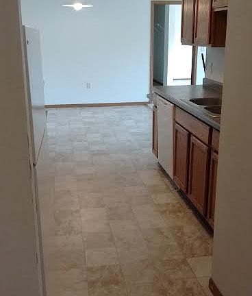new linoleum flooring throughout kitchen and bathrooms