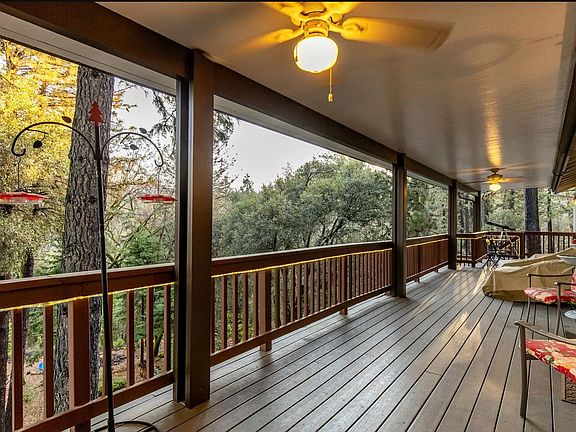 Deck accessed through living room sliding door
