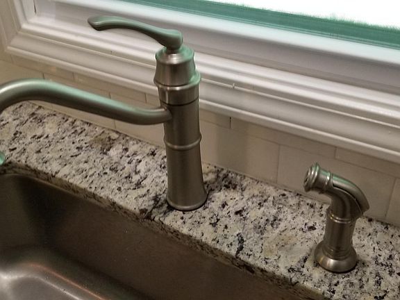 Elegant faucet and under-mounted sink.