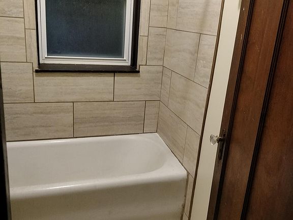 4th image of 7131 S Mozart St #1REAR