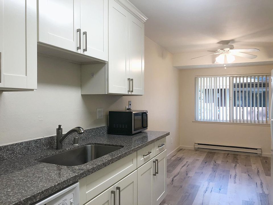 Unit 9 kitchen and dining room with microwave