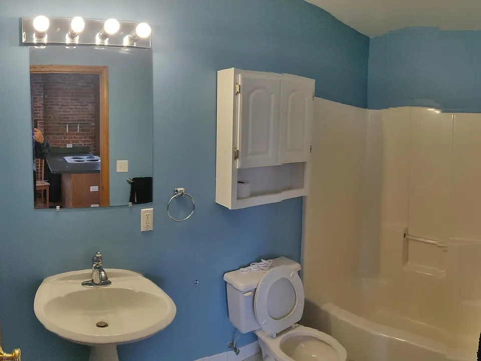 Bathroom with tub and shower