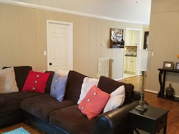 Livingroom : Living room showing door to the master and the entry way to the dining & kitchen