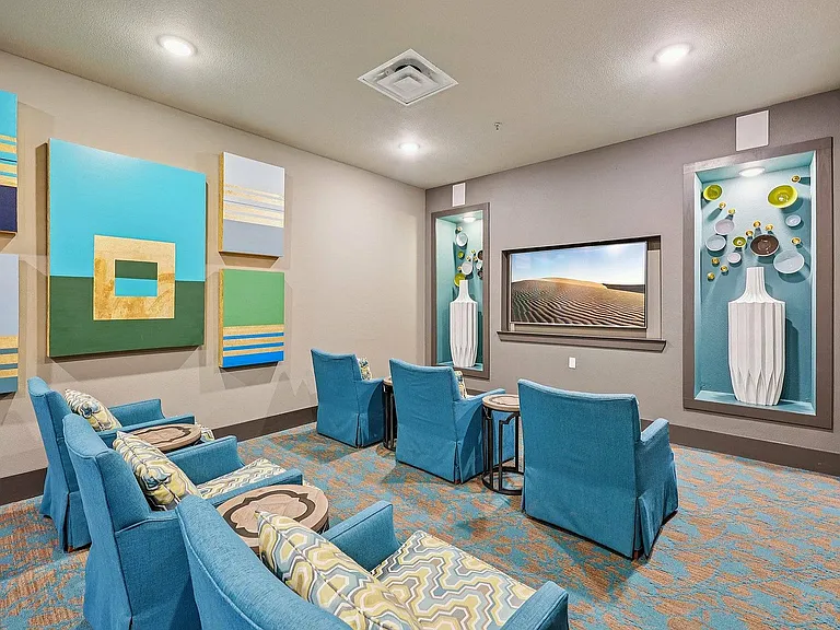 The private resident theater at McDermott 55 offers a cinematic experience just steps from your apartment.