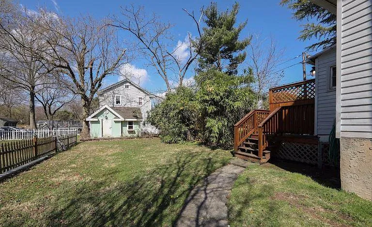 backyard with large shed for storage