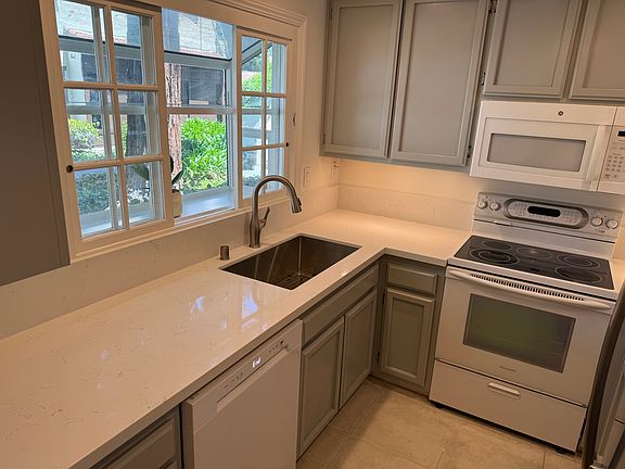 Kitchen. New counters. Bay window.