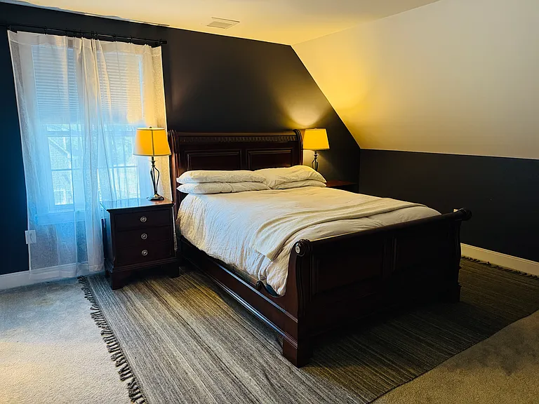 Master bedroom with queen bed. Room darkening shades.