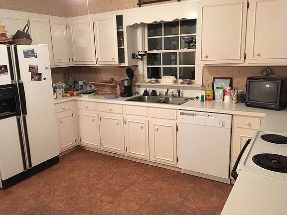 Kitchen with newly tiled flo