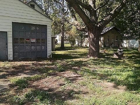 Back yard (east peak of back of house visible behind garage)