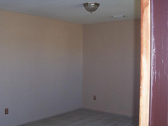 As you enter, on your right you'll see your spacious formal living or office area.