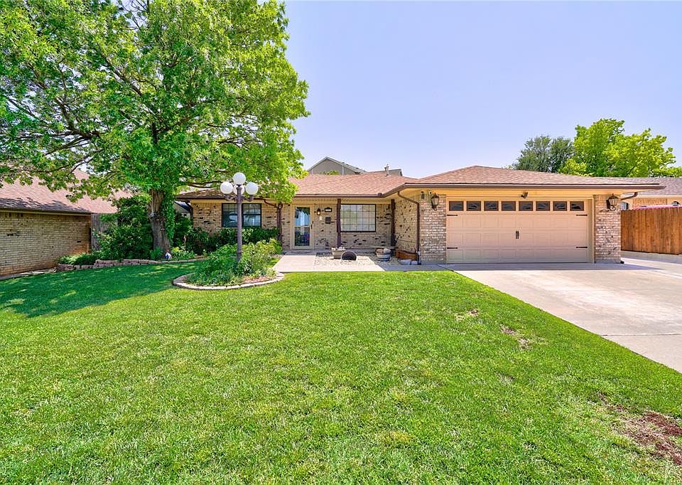 1st image of 6910 NW Sprucewood Dr