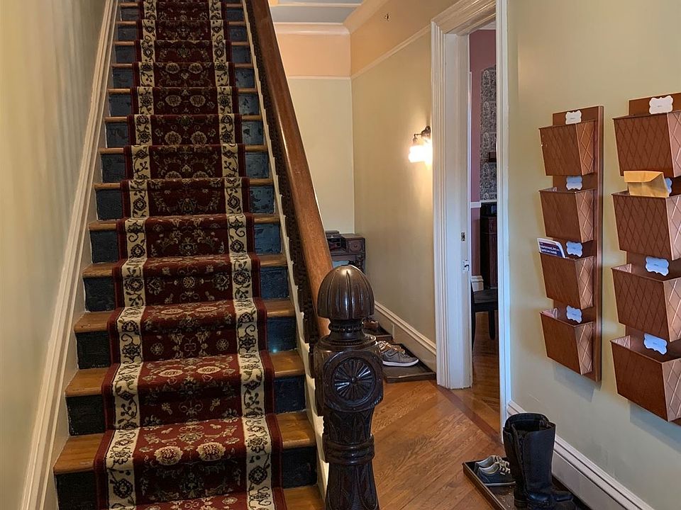 Downstairs front hall; shoes off in the house