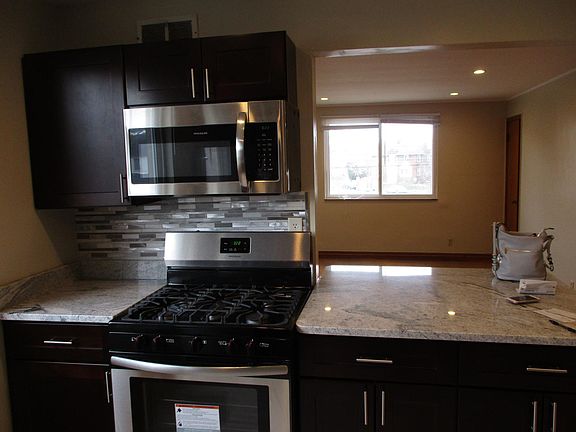 Right side of kitchen open to living room
