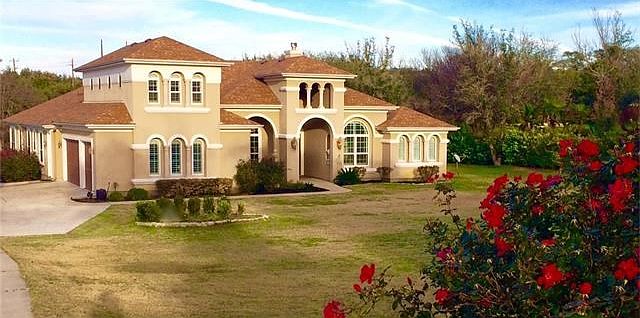 Spectacular 4BR Mediterraneanstyle home with unparalleled architecture. Situated on over two acres of beautiful lot with gorgeous oaks, in a highly coveted neighborhood, will make 17229 Rocky Ridge easy to call home!