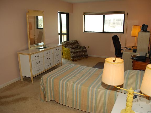 Master Bedroom with views and exit to balcony