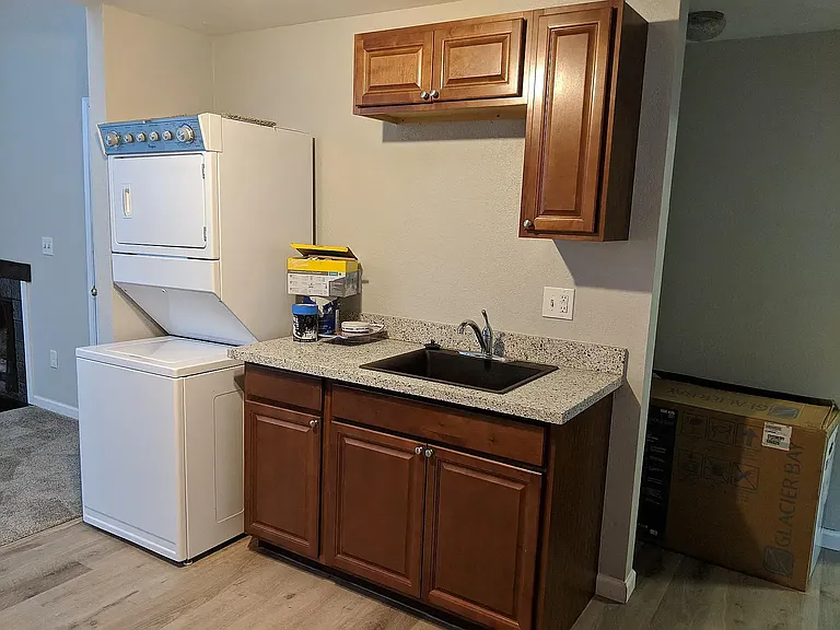 In-unit laundry, updated floors, kitchen cabinets and counter tops.