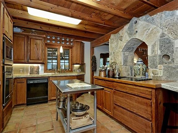 Kitchen with granite counters.