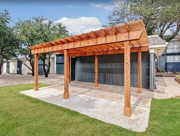 Shaded pergola and mailbox area