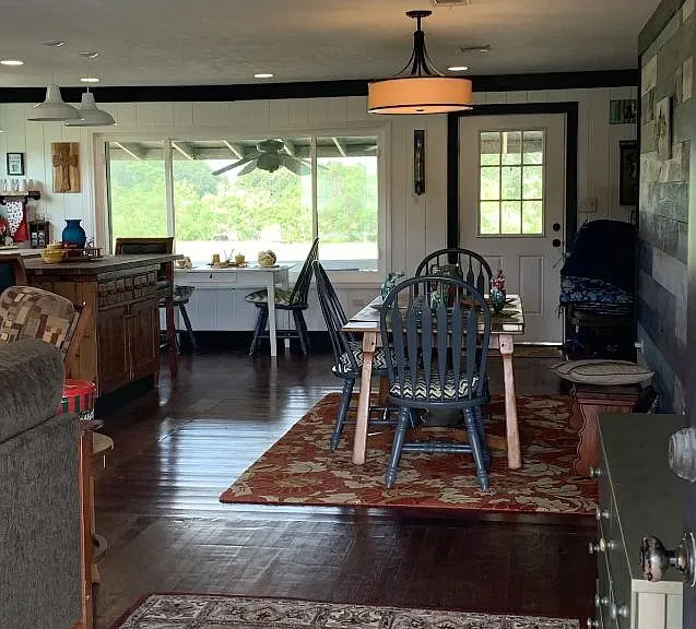 View from front door is a very open space with kitchen, dining and living area for gathering.