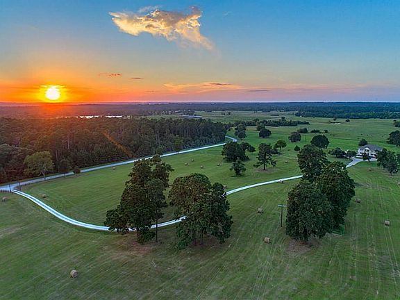 Country road, take me home! The property is located in a horse shoe configuration on Bowden Rd, limiting adjacent property to only one side and is located across the road from 6J Ranch, a 264 acre renowned horse ranch.