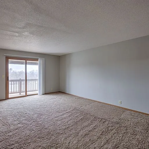 Living room with sliding glass doors at 108 Blondo.