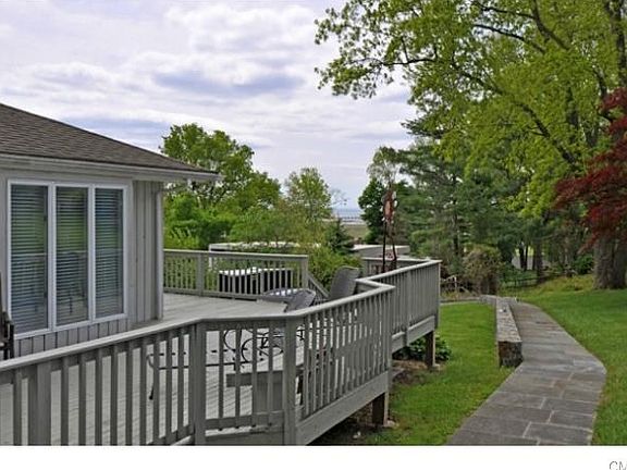 Back Deck with views of water golf course water and rolling hills
