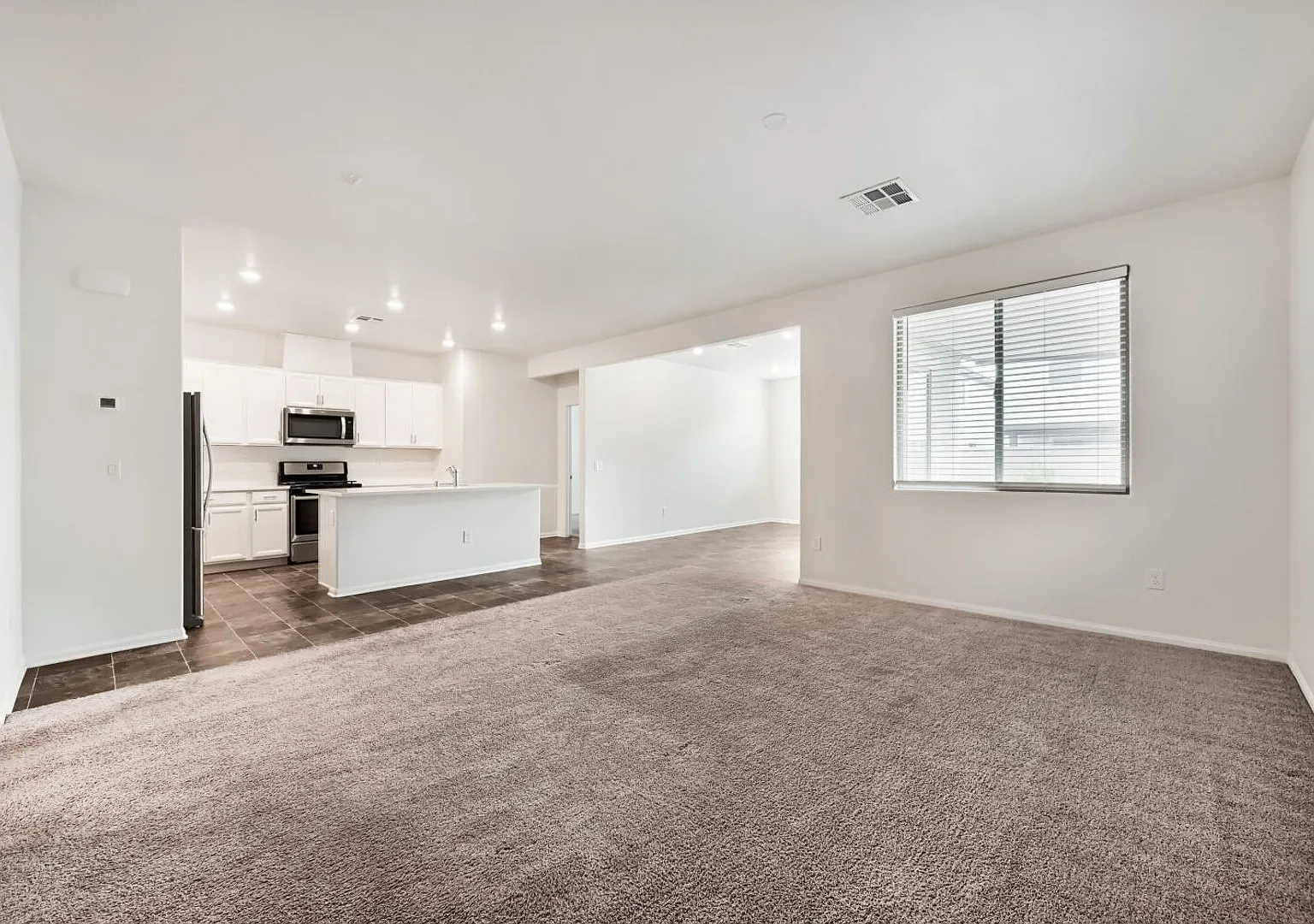 Bright & Spacious 3-Bedroom Home with Covered Patio! — Photo 3
