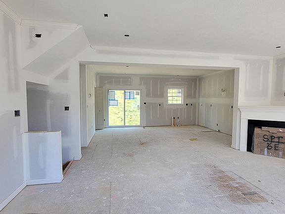 6E drywall finished on main level living area- view into fam