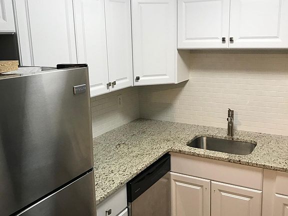 Brand new countertops, cabinets, backsplash, and appliances!