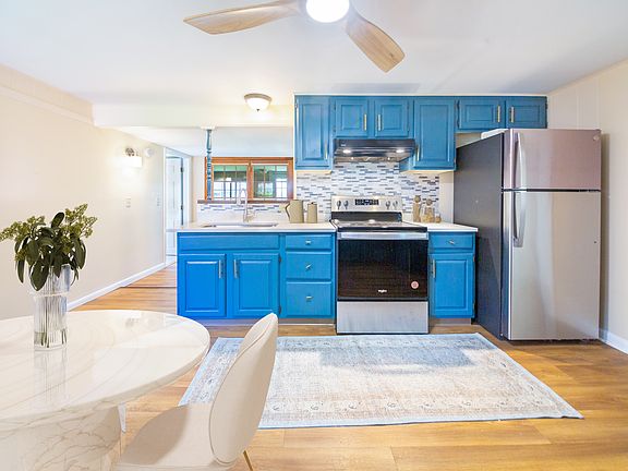 Kitchen with brand new stainless steel appliances, stone countertops, sink & faucet