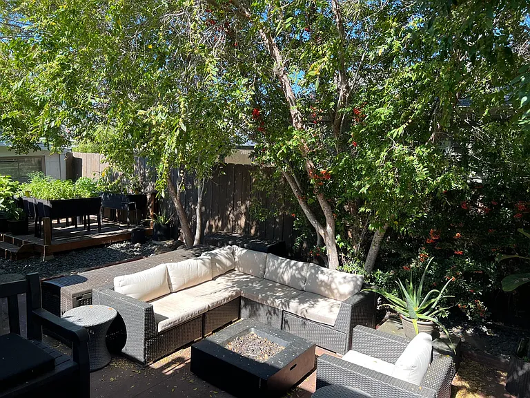 View of patio lounge from bedroom 1
