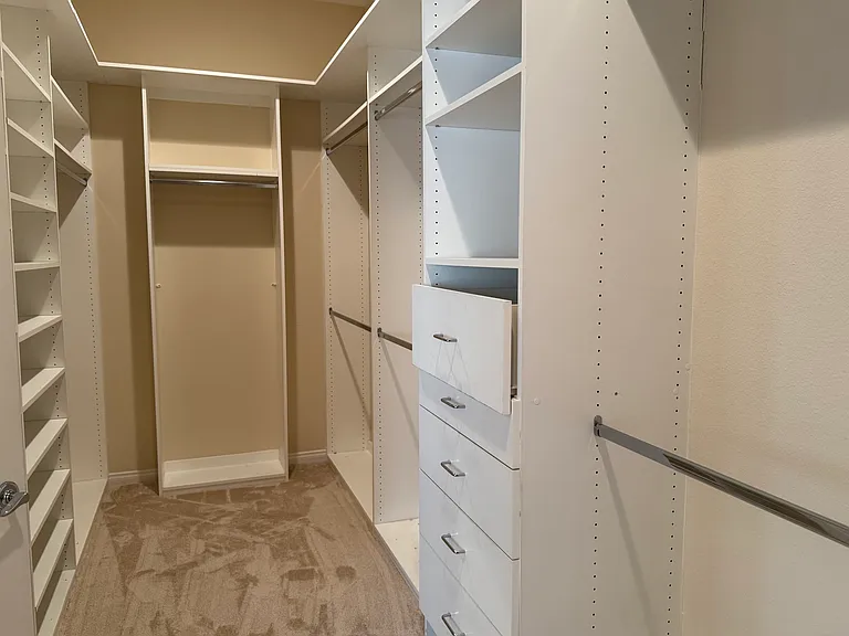 PRIMARY WALK-IN CLOSET