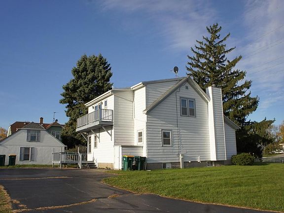 Side Exterior w/Rental in left backgrd