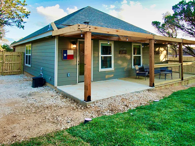 Enjoy the spacious fully fenced backyard featuring a covered patio perfect for relaxing or entertaining.