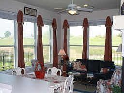 Gorgeous sunroom with lots of natural light and great view!